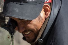 Mr Smanla looking through the spotting scope Smanla Tracking the Leopard